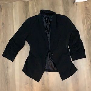 Women’s blazer. Black, Size Medium with bunched sleeve style.